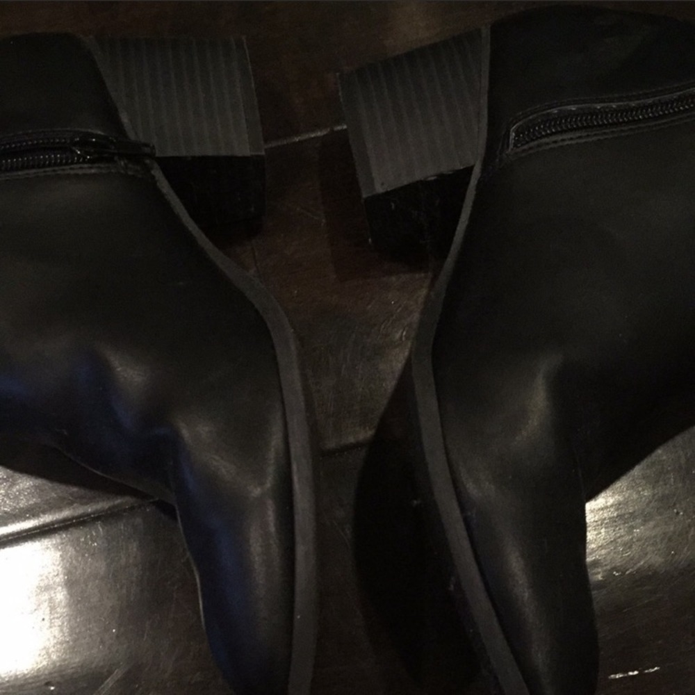 black booties with gold zipper